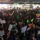 Protestors outside Los Angeles International Airport on Sunday (Diana Moskovitz/Deadspin)